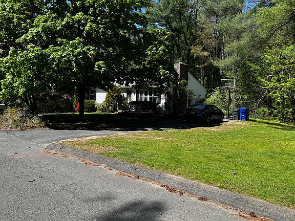 Side yard and driveway.