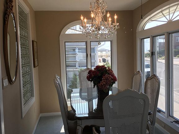 gorgeous dining room with an ocean view