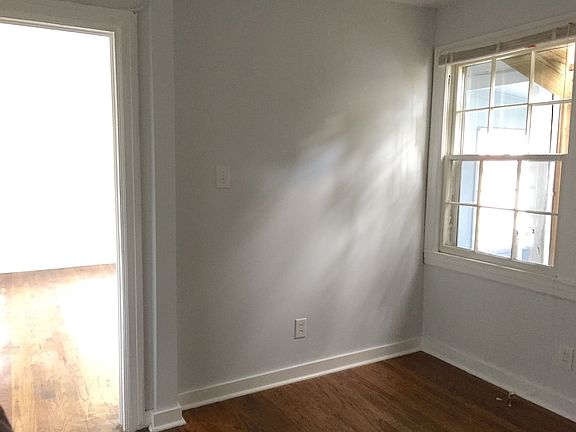 Bedroom 1 off living room has armoire . Could also be great office or play room.