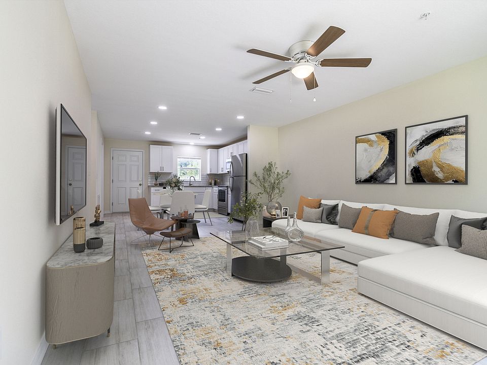 Combo living/dining area. Tile throughout.
