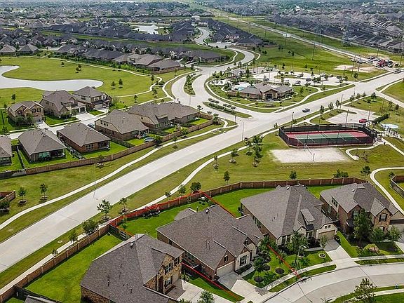 This home truly has it all and is just a quick walk to the amenity center!