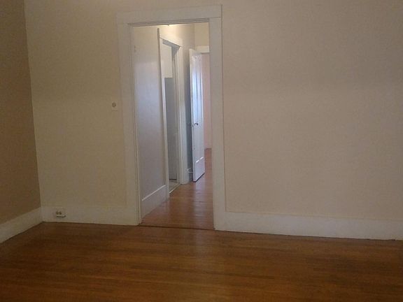 Middle room, includes large additional storage closet (facing hall to bedroom, kitchen and bath).
