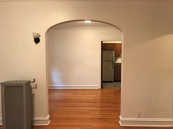 Living room looking into dining room and kitchen