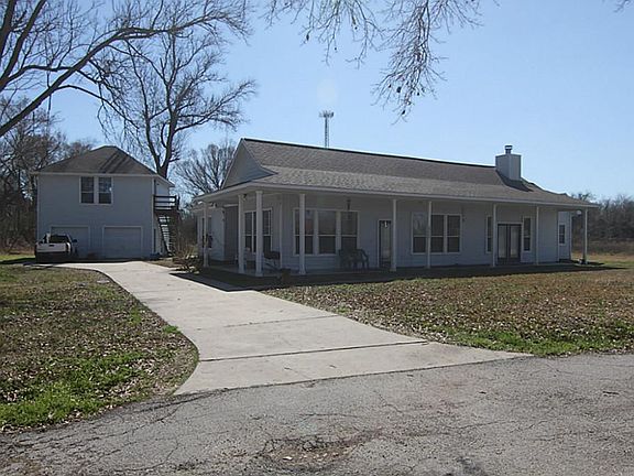 DETACHED GARAGE OFFERS A GAMEROOM OVER 500 SQFT.