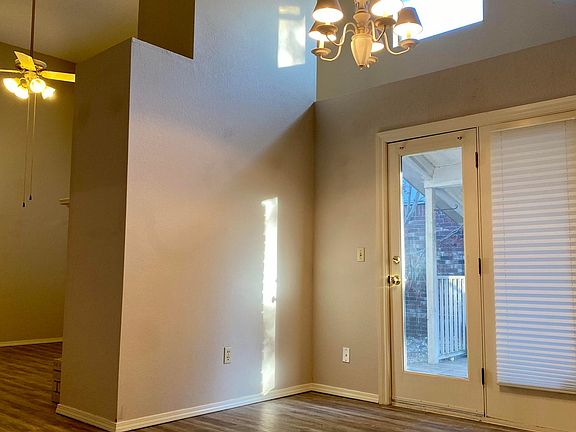 Dining room with French doors to covered patio.