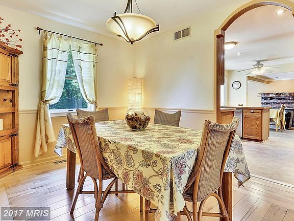 Formal Dining Room with Maple Flooring