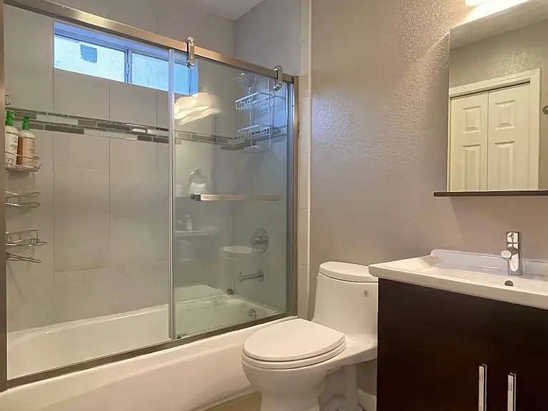 Bathroom with linen closet and Grohe fixtures