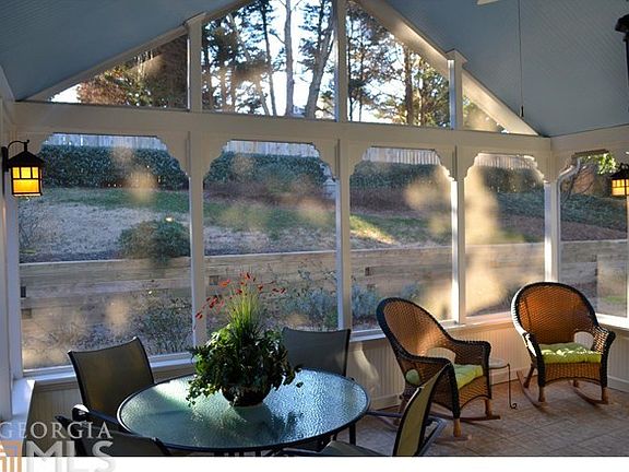 Spacious Screened Porch overlooks Private Backyard!