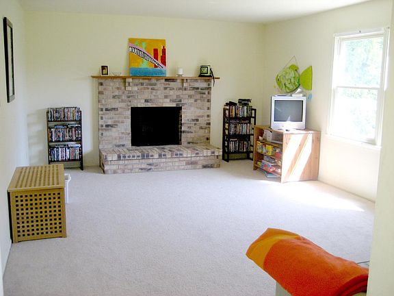 Large family room with brick fireplace