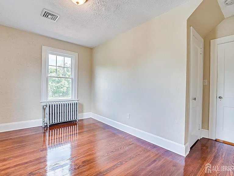 338 Buckelew Ave — Photo 23