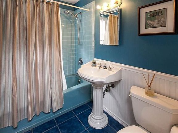 FULL CERAMIC TILED BATH WITH PEDESTAL SINK,CRWN MLDGS & WAINSCOT PANELS