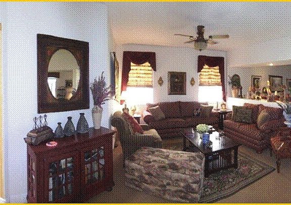 foyer and living area panoramic view