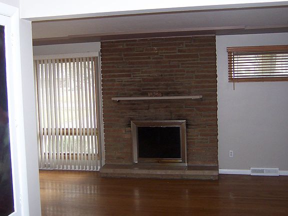 Natural hardwood and wood fireplace.