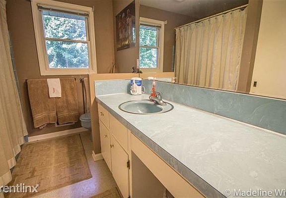 Upstairs Bathroom with tub & shower; full closet for storage