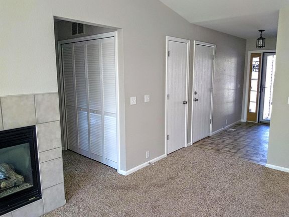 Living room looking toward front door.