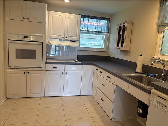 5th image of 7907 SAILBOAT KEY BOULEVARD S #105