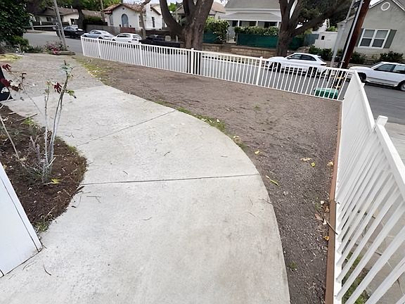 Front walkway , taken from front steps. The space is yours to garden, have a BBQ, etc.