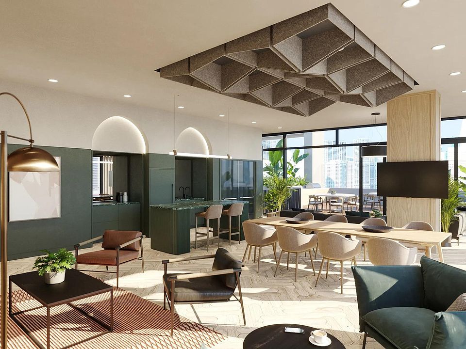 36th-floor social lounge with gathering space, demonstration kitchen, and outdoor terrace.