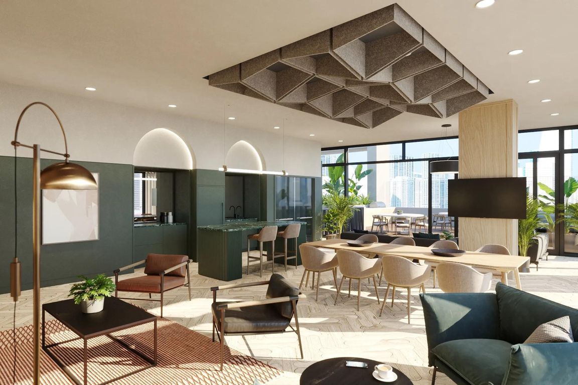 36th-floor social lounge with gathering space, demonstration kitchen, and outdoor terrace.