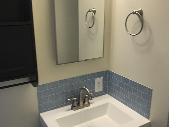 Bath - new vanity medicine chest along with wood cabinet