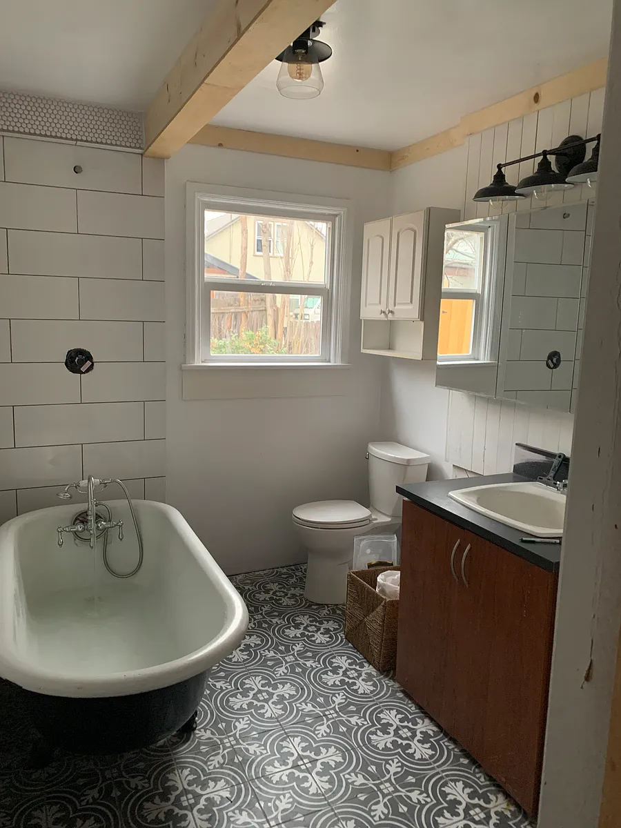 1 bathroom with claw foot tub and Shower. - 3315 N 33rd St