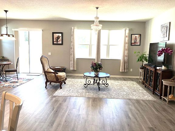 Family room, with lots of windows to bring in the natural sun light