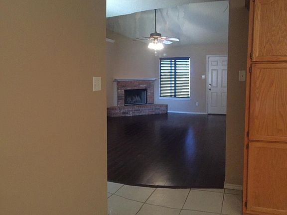 VIEW FROM KITCHEN INTO LIVINGROOM