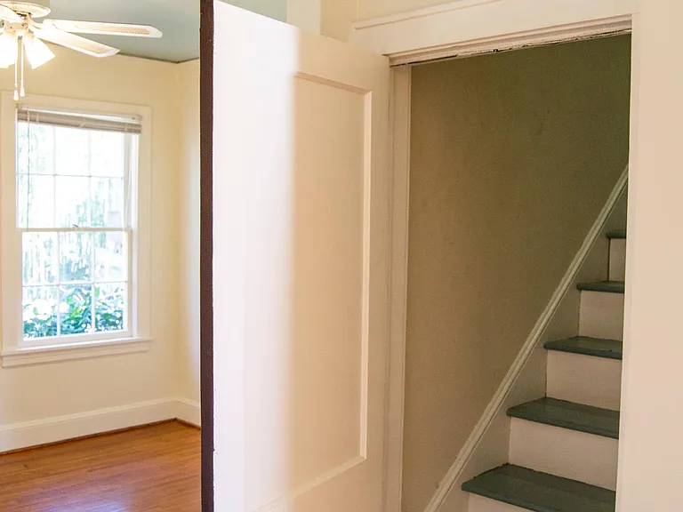 Stairs to full attic for ample storage use