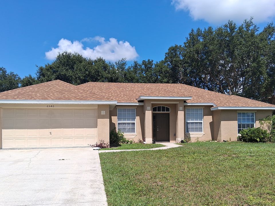 beautiful front elevation on corner lot with new roof