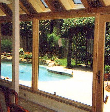 Sun Room & Pool from Kitchen