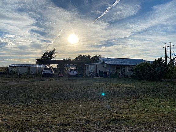 Shop, carport, storm shelter