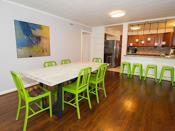 Dining room with kitchen counter eating area