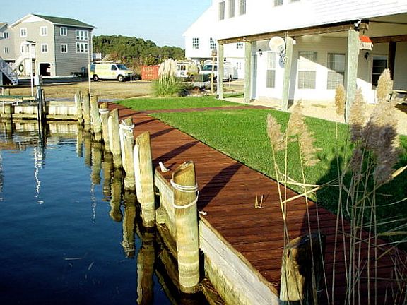 Dock your boat only a few steps from the back door at your private bulkhead