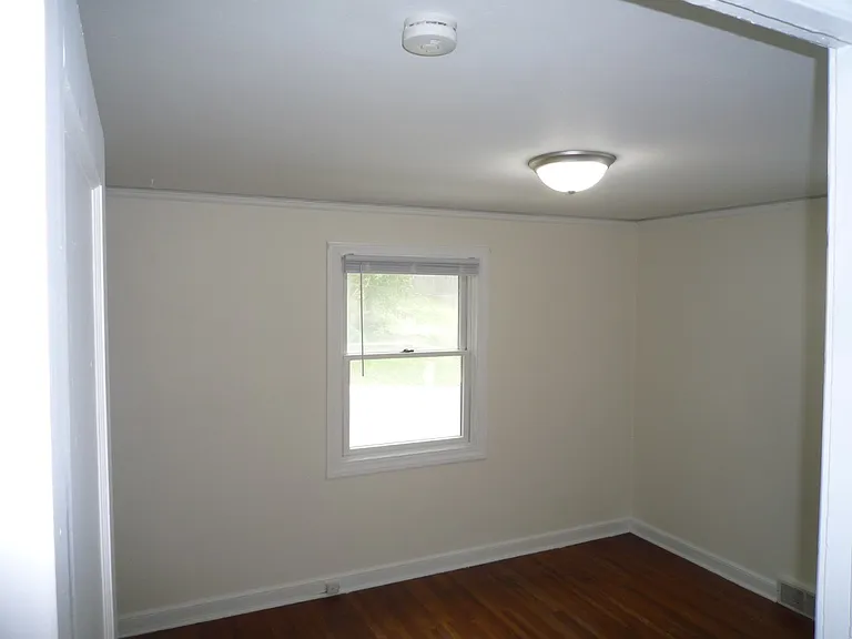 Bedroom #1 upstairs, energy efficient windows, cross ventilation