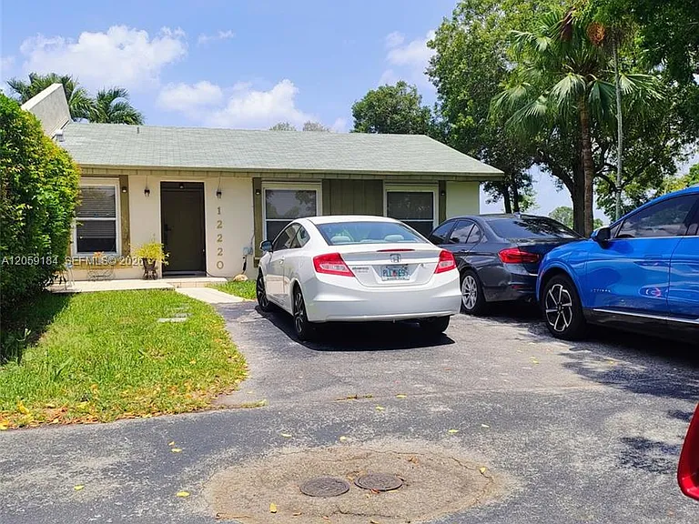 12220 SW 111th Ter #12220 — Photo 1