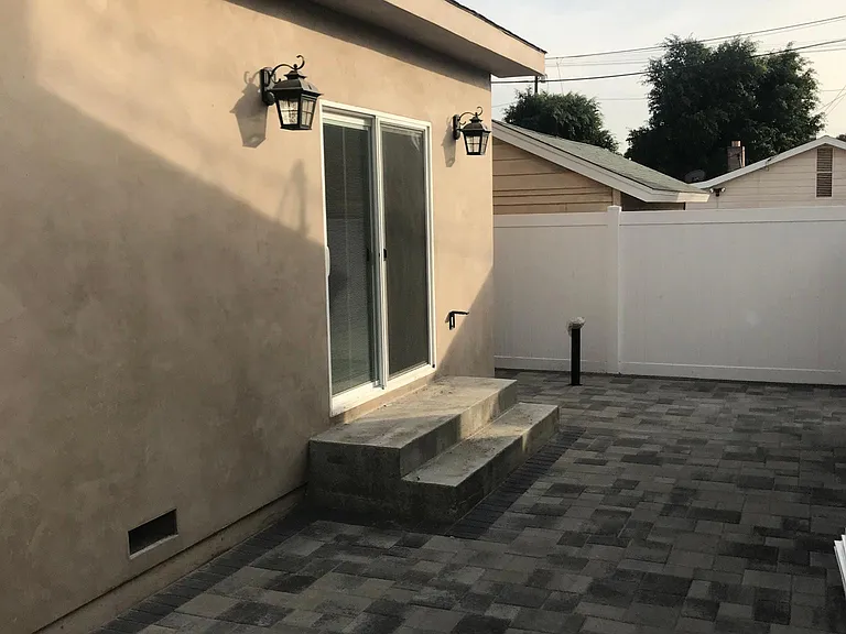 Sliding door from kitchen to private terrace/courtyard