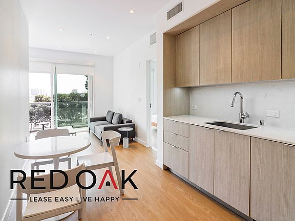 2nd image of 8820 1/3 Belford Ave #3122