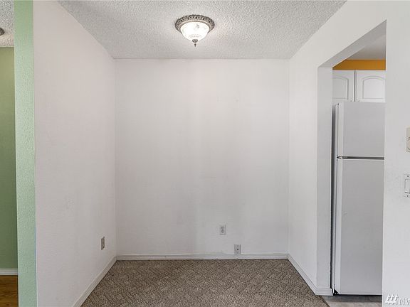 A study nook off the living room is the ideal space for a designated desk/computer area. 