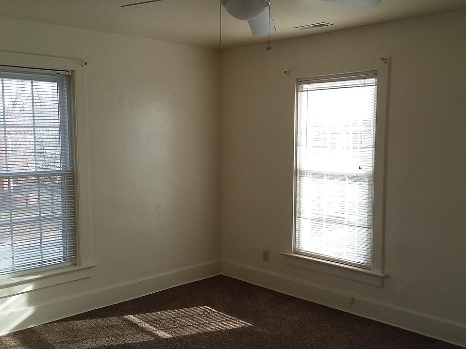 Living room with view of windows to Franklin Street.