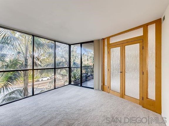 Custom bamboo glass entry doors to the master bedroom with view