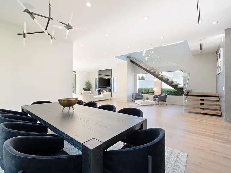 Enjoy a delicious meal at the 10-person dining table