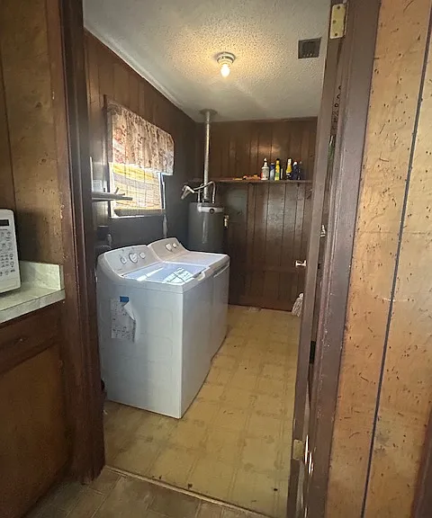 Laundry/Pantry off kitchen with washer and dryer