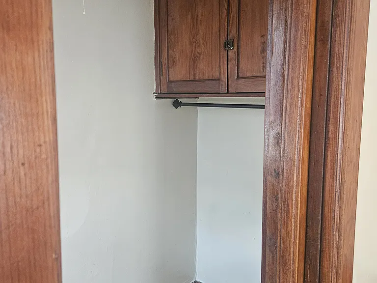 Dinning room closet with cabinets