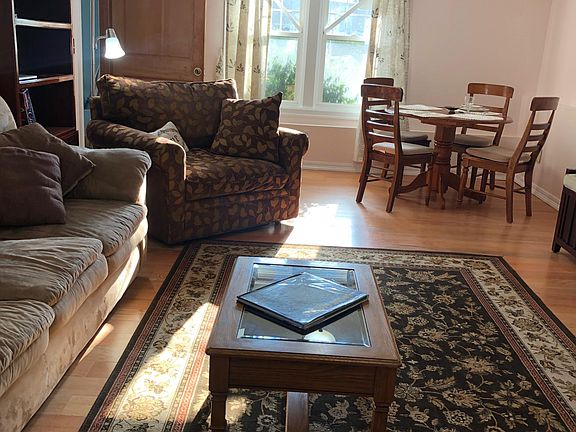 Another view of Living Room with dining area seating for four