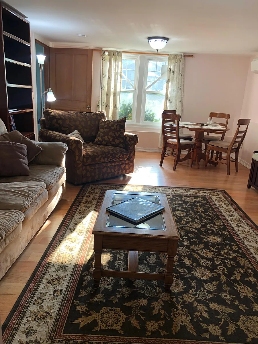 Another view of Living Room with dining area seating for four - 26th Ave NE