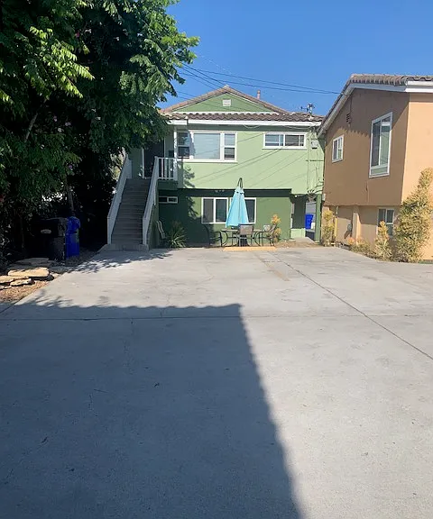 Entry and 2 parking spots right in front