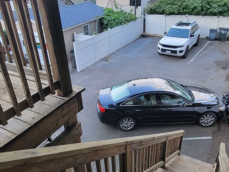 Private back Deck Entrance with 2 parking spots