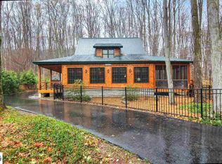 11693 Fisher Dr, Kewadin, MI 49648