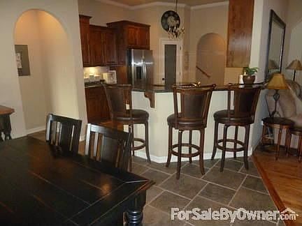 Breakfast nook : Nook open to kitchen and living room with bar eating area.