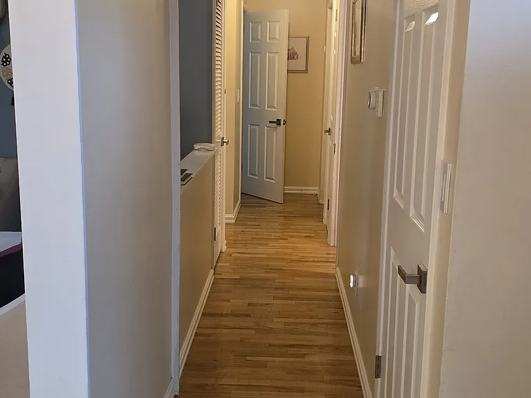 Hallway to bedrooms and bathrooms